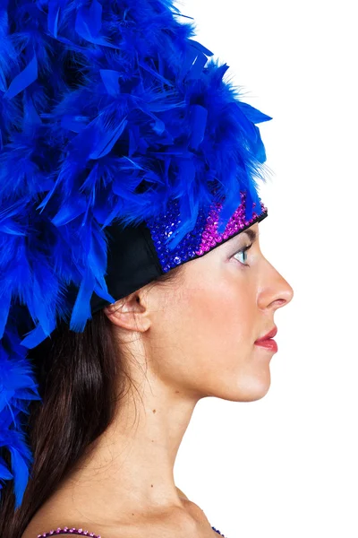 Girl in a hat with feathers — Stock Photo, Image