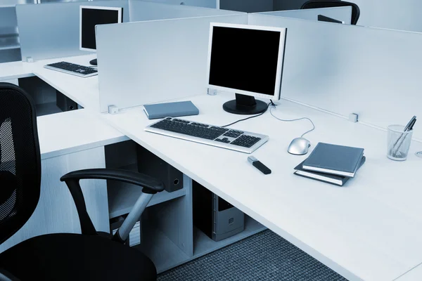 Computers on the desks — Stok fotoğraf