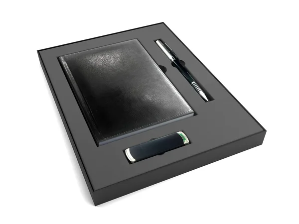 Caixa preta com bloco de notas, caneta e flash drive — Fotografia de Stock