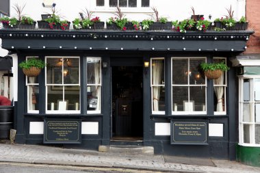 Exterior shot of a classic old Pub in London, UK clipart