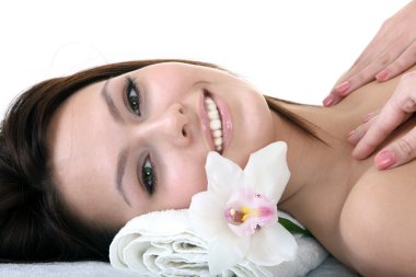 Beautiful young woman in spa. clipart