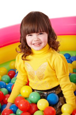 Happy child in group colourful ball. clipart