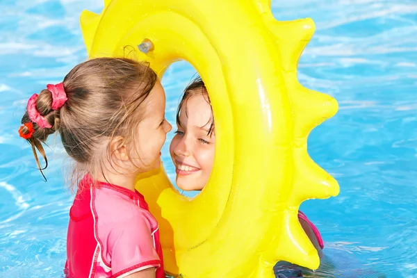Children playing inflatable ring. — Stock Photo, Image