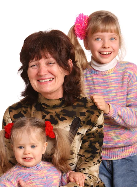 Gelukkig grootmoeder en twee kleindochter. — Stockfoto