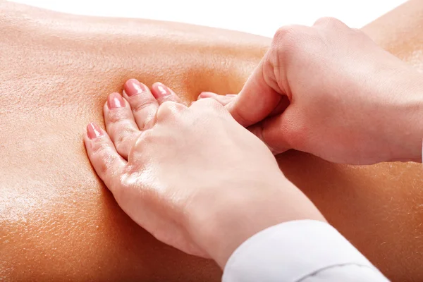 Massage av kvinnliga tillbaka. — Stockfoto