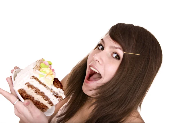 Girl eating piece of cake. — Stock Photo, Image