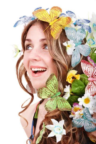 Meisje met butterfly en flower op hoofd. voorjaar haar. — Stockfoto