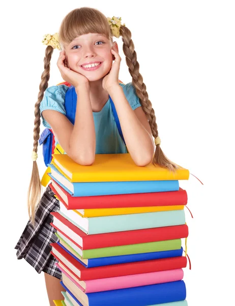 Colegiala con mochila sosteniendo pila de libros . —  Fotos de Stock