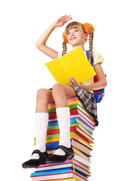 Studentessa seduta su mucchio di libri . — Foto Stock