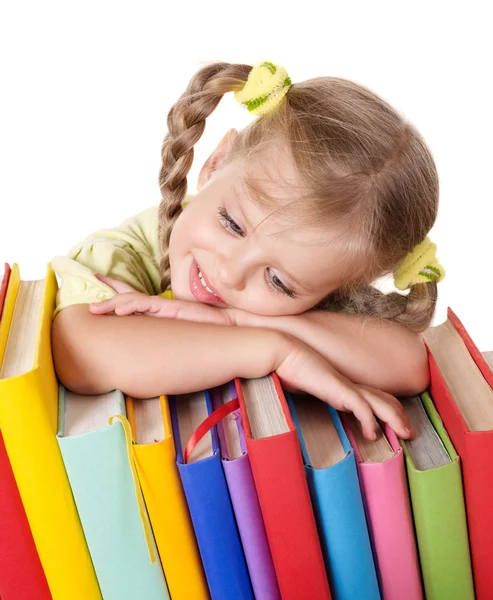 Niño sosteniendo pila de libros . — Foto de Stock