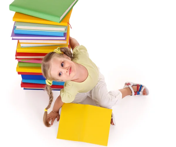 Çocuk holding yığın kitap. — Stok fotoğraf