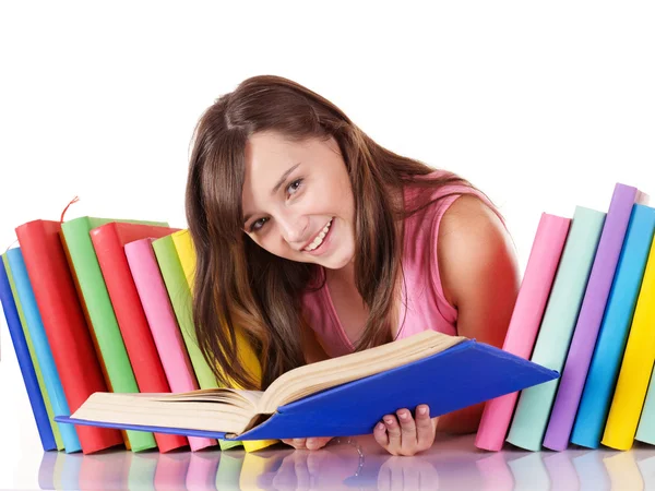 Dívka s knihou barevné hromádky. — Stock fotografie