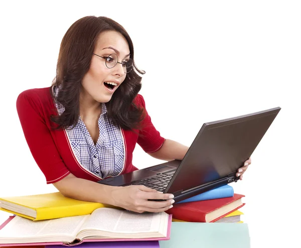 Meisje met stapel kleur boek en laptop. — Stockfoto