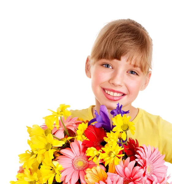 Niño feliz sosteniendo flores . — Foto de Stock