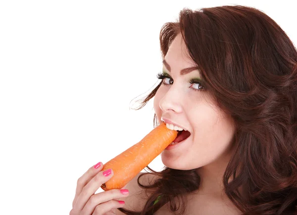 Face of girl eating carrot. Stock Photo