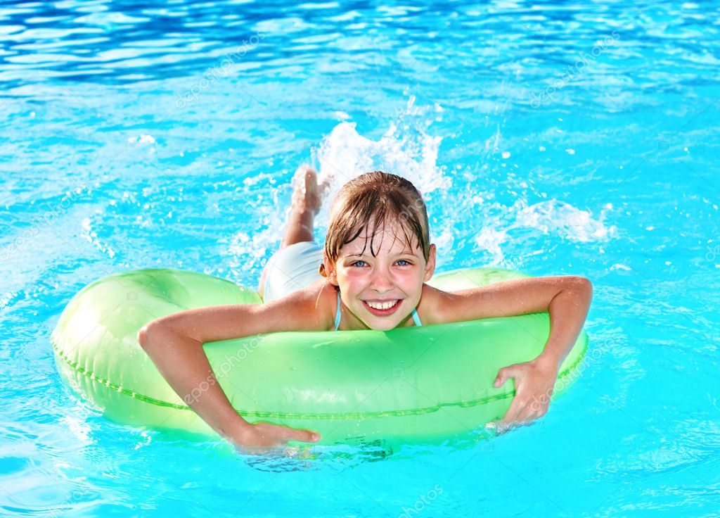 Child sitting on inflatable ring. Stock Photo by ©poznyakov 5736018