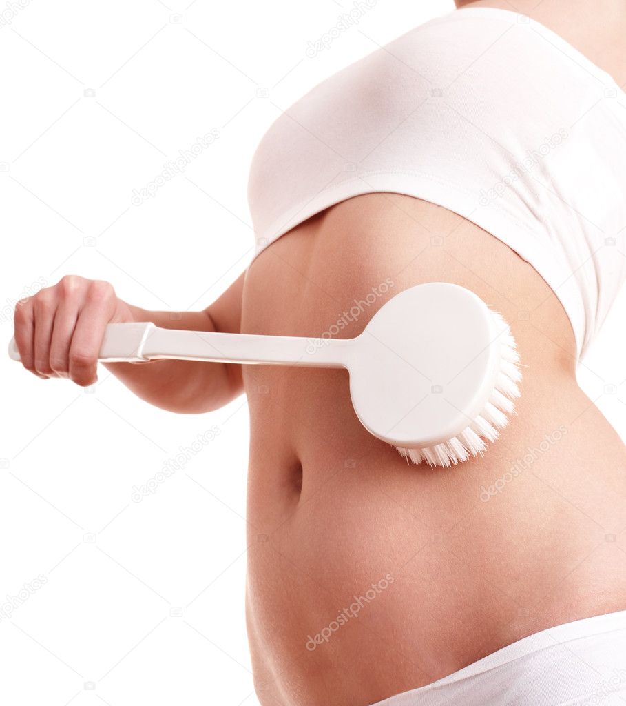 Young woman scrubbing body.