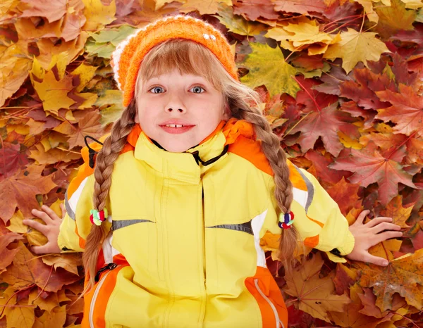 Child in autumn orange leaves. — Stock Photo, Image