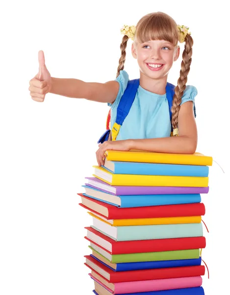Estudante com pilha de livros e mostrando o polegar para cima . — Fotografia de Stock