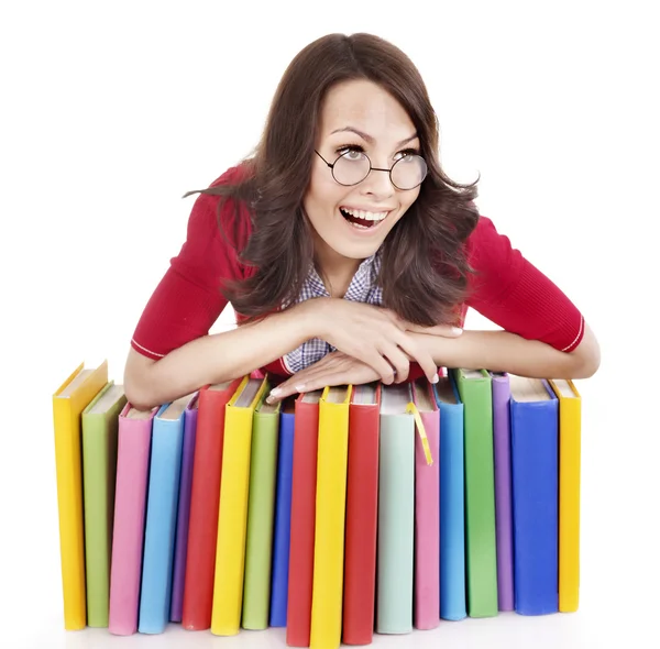 Дівчина в окулярах з купою книг  . — стокове фото