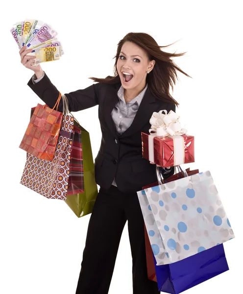 Podnikání žena s penězi, dárkové krabice a tašky. — Stock fotografie