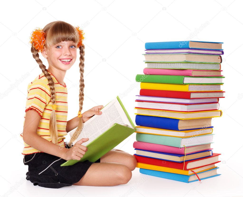 Schoolgirl reading pile of books.