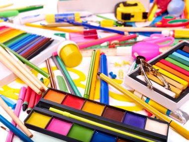 Background of school supplies. clipart