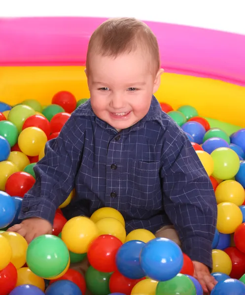 Birthday of fun boy in balls. — Stock Photo, Image