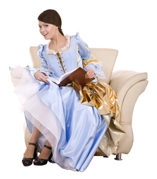 Menina em vestido azul loiro com livro na cadeira . — Fotografia de Stock