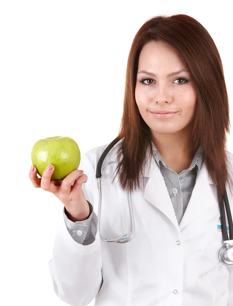 Médecin avec stéthoscope et pomme verte . — Photo