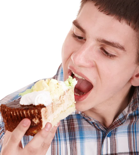 男子吃蛋糕的人脸. — 图库照片