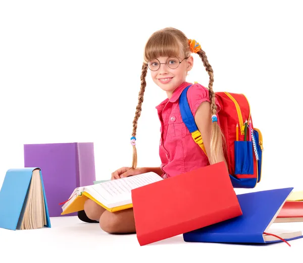 Happy sitting schoolgirl in eyeglasses with pile of books. — Stock Photo, Image