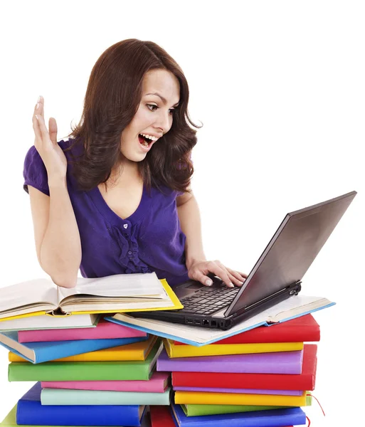 Mädchen mit Stapel Farbbuch und Laptop. — Stockfoto