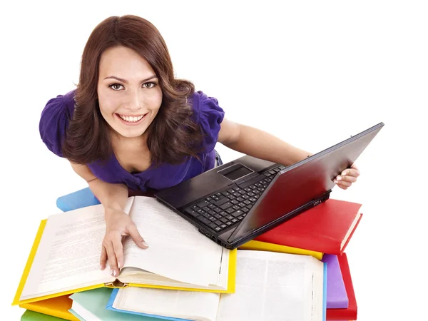 Flicka med stack färg bok och laptop. — Stockfoto