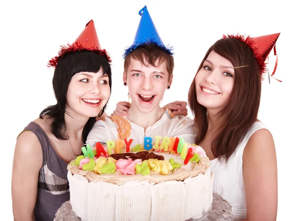 Grupp glada unga med tårta. Royaltyfria Stockfoton