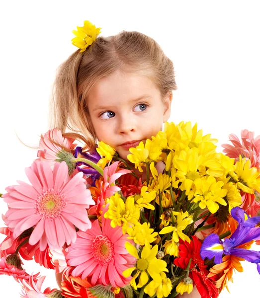 Glückliches Kind mit Blumen. — Stockfoto