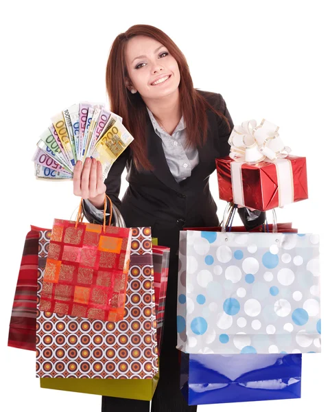 Donna in possesso di denaro, confezione regalo e shopping bag . — Foto Stock