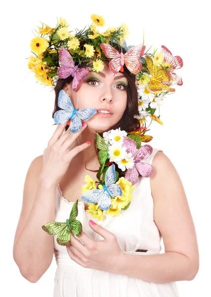 Дівчина з метеликом і квіткою на голові . — стокове фото