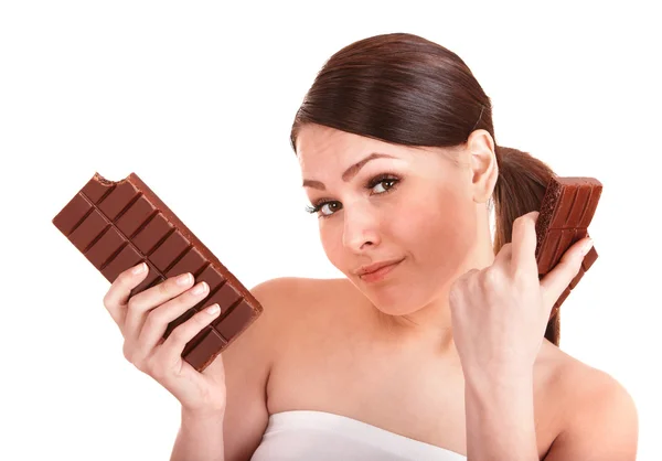 stock image Beautiful girl bite chocolate bar.