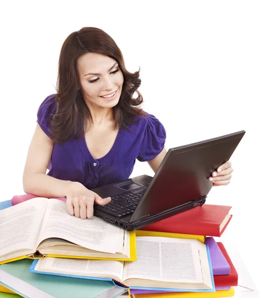 Meisje met stapel kleur boek en laptop. — Stockfoto
