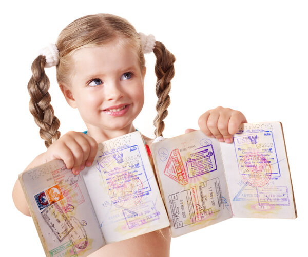 Child holding international passport.