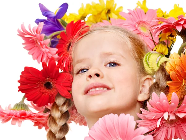 Dziecko z kwiatami na włosy. — Zdjęcie stockowe