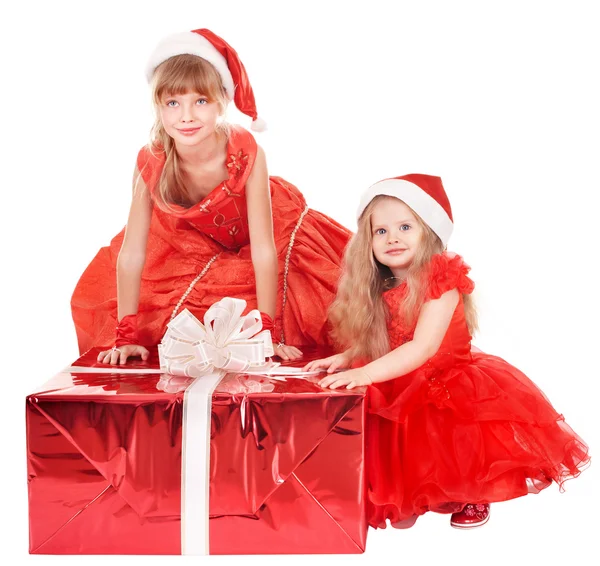 Children in santa hat holding gift box. — Stock Photo, Image