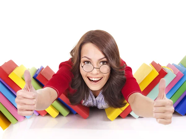 Thumb up of girl in glasses with stack book . — Stock Photo, Image
