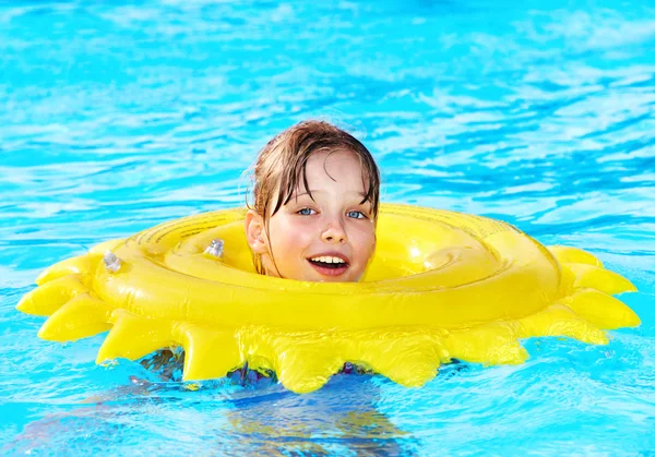 Child on inflatable ring . — Stock Photo, Image