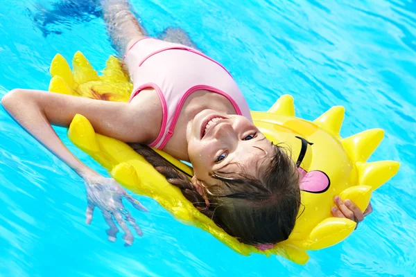 Child on inflatable ring . — Stock Photo, Image