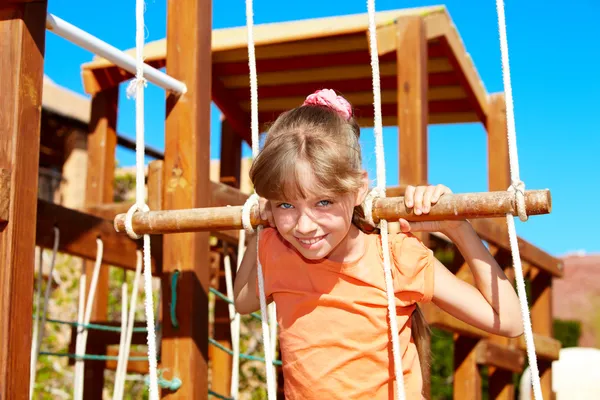 Child climbing on slide. — Stock Photo, Image