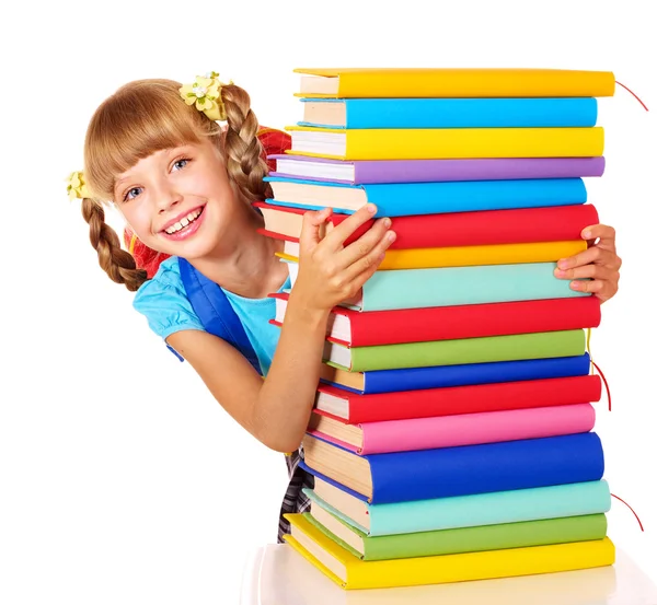 Écolière avec sac à dos tenant pile de livres . — Photo
