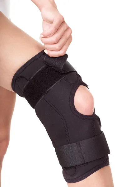 Trauma of knee in brace. — Stock Photo, Image