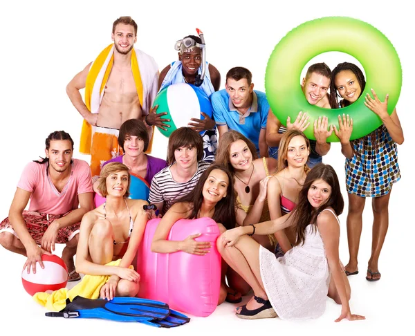 Skupina drží plážové Doplňky. — Stockfoto